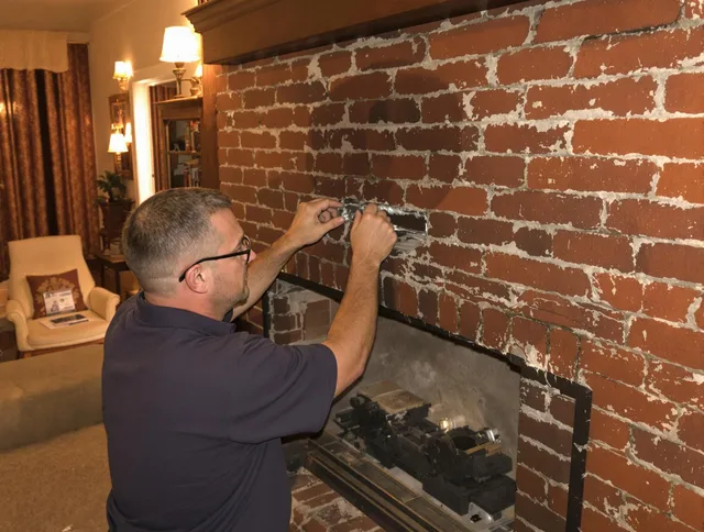 Delray Beach Chimney Sweep expert fixing a fireplace in Delray Beach, FL